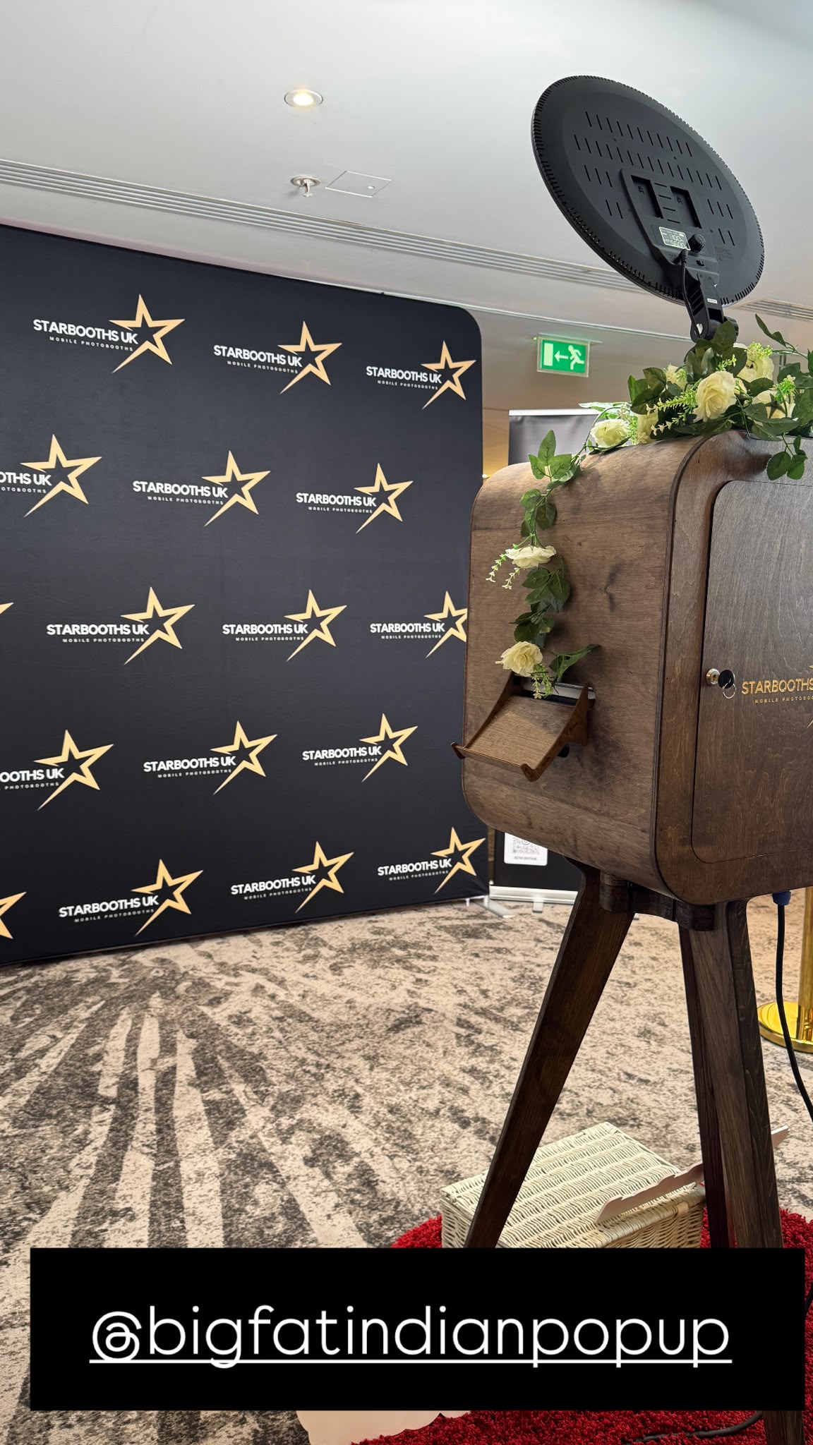 StarBooths UK branded backdrop and vintage booth set up at a corporate event